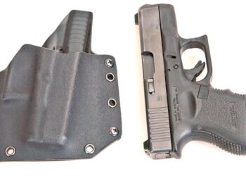 The Raven Concealment Phantom holster with a Glock 26 9mm Third Generation. This holster will never make it into any art museum, but since form follows function it has its own beauty.