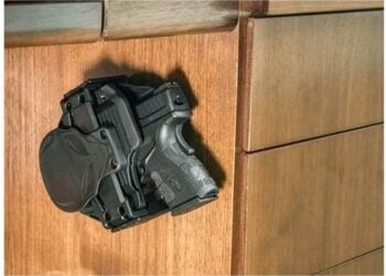 Cloak Mod OWB Holster and Gun Fits in the Cloak Dock Mounting Bracket Attached to Desk
