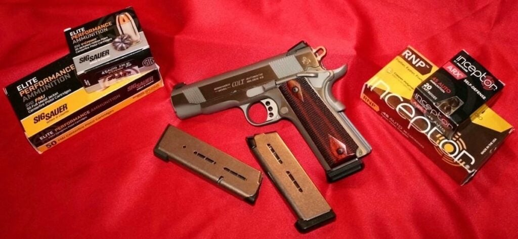 Colt 1911 .45 Commander with Wilson Combat Mags and Sig Sauer and Polycase Ammo