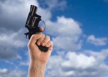 Man Fires Warning Shot In Air When Threatened with a Trash Can