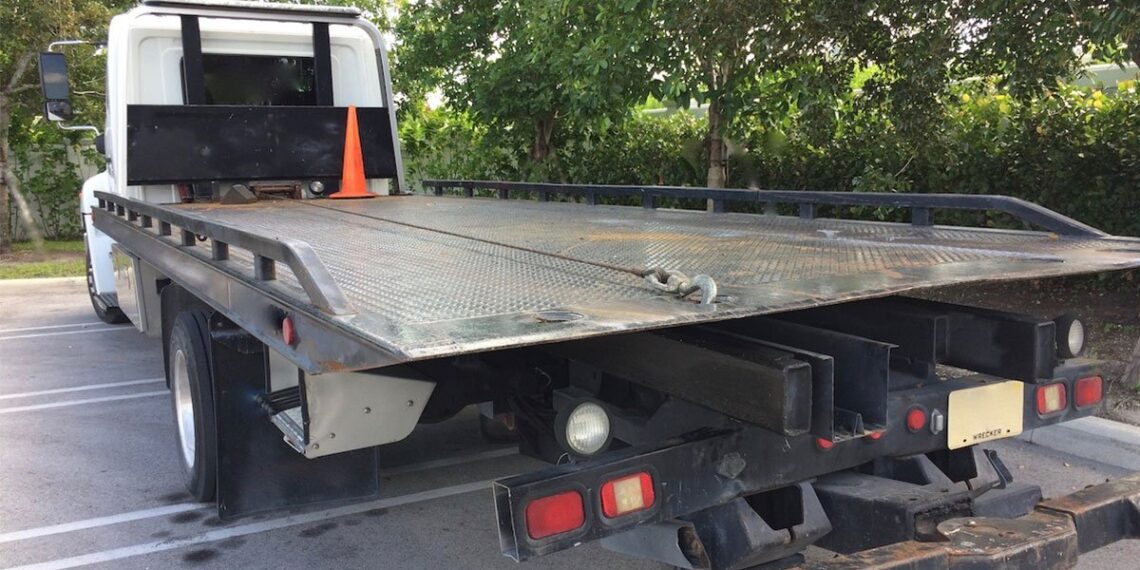 Robber Calls 911 After He Steals Tow Truck and Owner Holds Him at Gunpoint