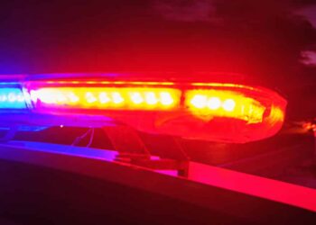 Woman Holding Baby Takes Attackers Gun; Shoots Him