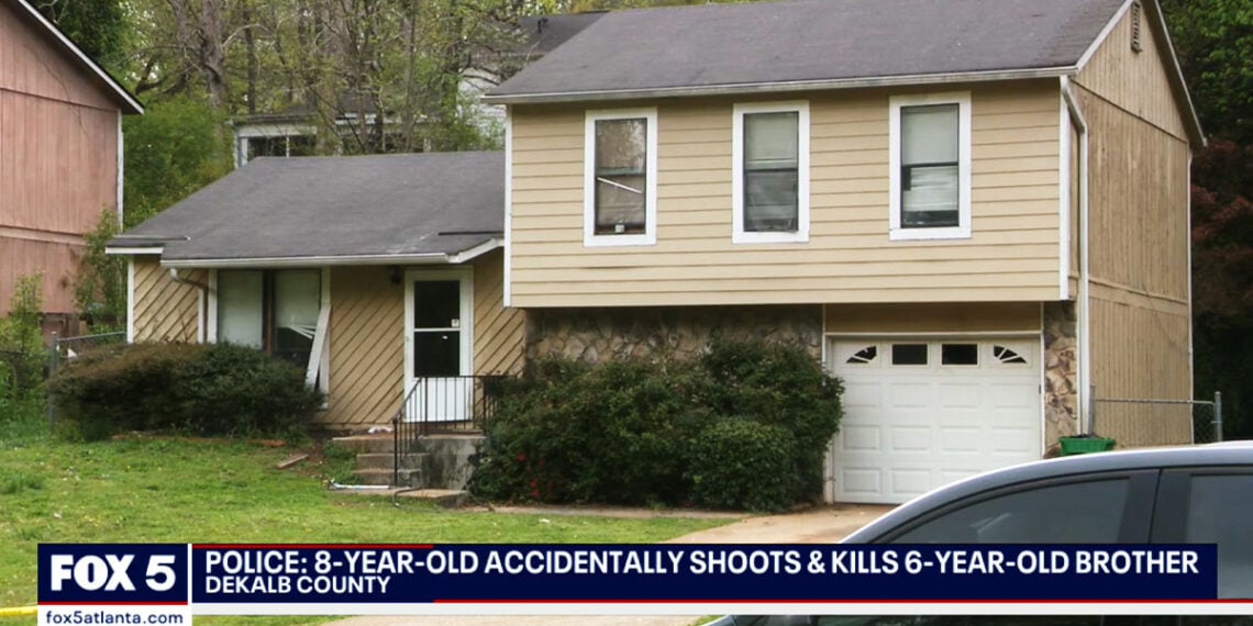 Boy Fatally Shoots Younger Brother w/ AR-15 Left on Floor; Father Charged w/ Murder