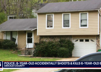 Boy Fatally Shoots Younger Brother w/ AR-15 Left on Floor; Father Charged w/ Murder