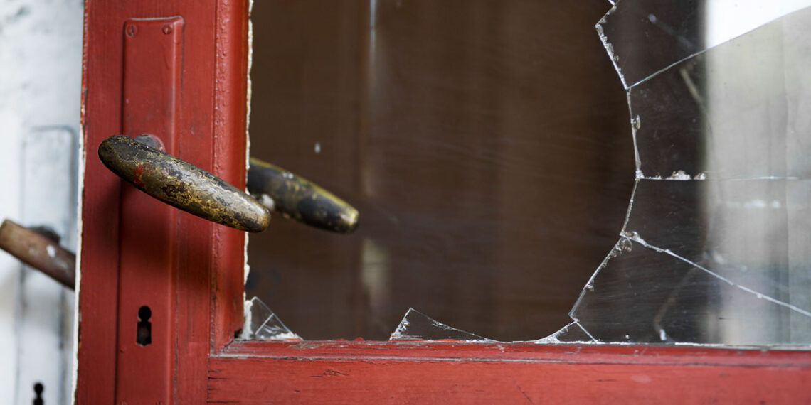 Homeowner Shoots Intruder As He Crawls Through Window on Front Door