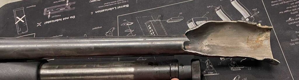 exploded barrel of a shotgun 