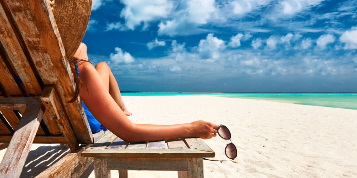 Man Cleaning Sand from Gun Negligently Shoots Woman on Beach