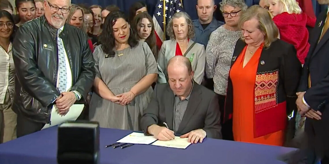 Governor Polis Quietly Signs Sweeping Semiautomatic Firearm Ban Into Law Behind Closed Doors
