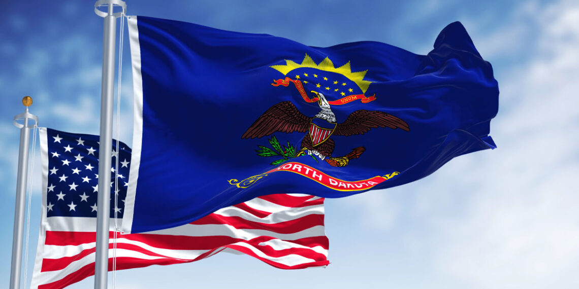 North Dakota Governor Signs Law Easing Concealed Carry Rules and Public Gathering Penalties