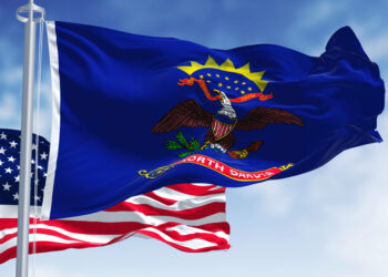 North Dakota Governor Signs Law Easing Concealed Carry Rules and Public Gathering Penalties