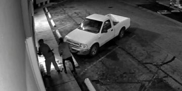 Shot by Burglars Four Years Ago, Tucson Gun Shop Owner Now Parks His Pickup Across His Storefront Every Night After Thieves Ram Two Nearby Gun Stores in One Week