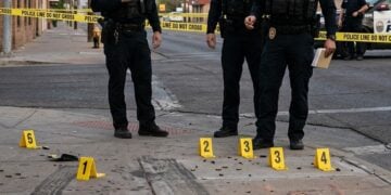 Two Men With a Knife and a Pole Were Beating a Third. Then a Fourth Man Stepped In and Opened Fire.